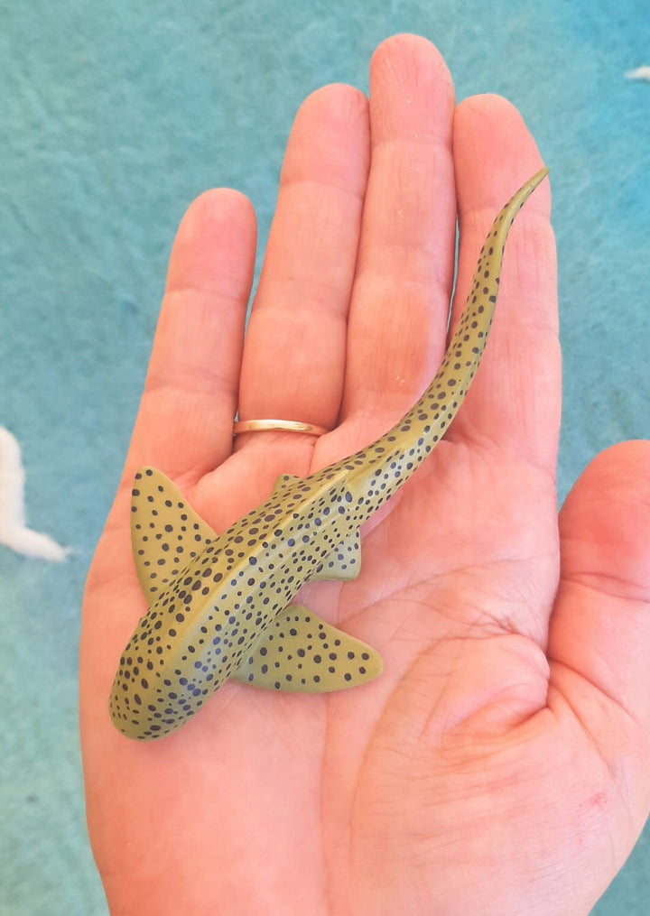 toy figurine of zebra shark